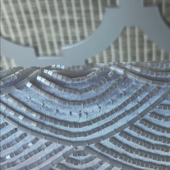 Chic White Wristlet Clutch with Intricate Design - Picture 3 of 10